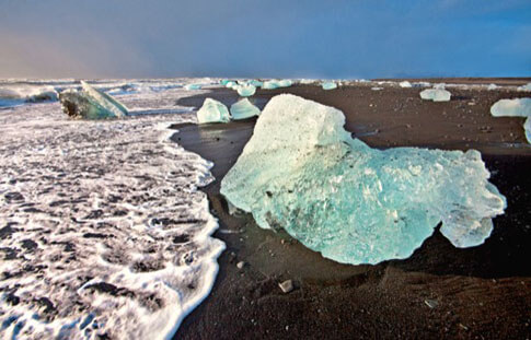 Island - Eis auf Lavastrand